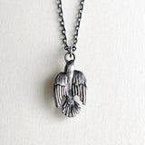 silver sparrow on cream background